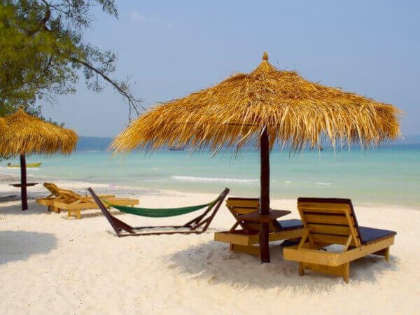 Relax with a cocktail and a good book Recliners on the pure sand
